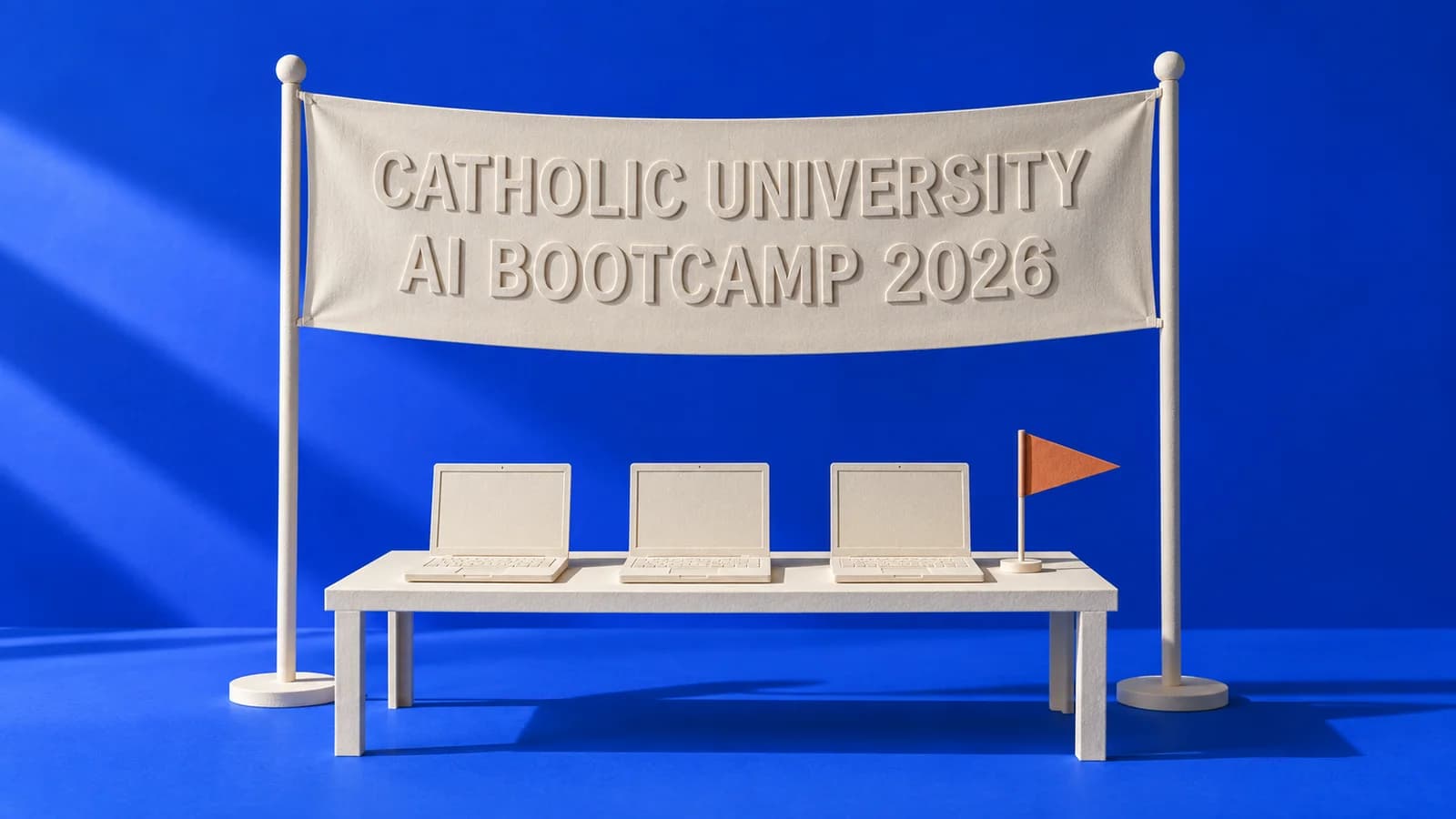 CATHOLIC UNIVERSITY AI BOOTCAMP 2026 이라고 적힌 종이 현수막 아래 종이 노트북 세 대가 놓인 오브제 사진